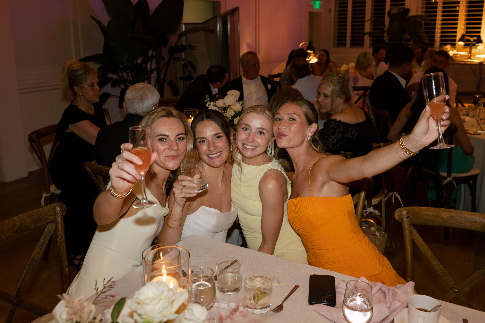Couple celebrating with friends at their Ritz Carlton Naples wedding photos by Veronica Costa Photography