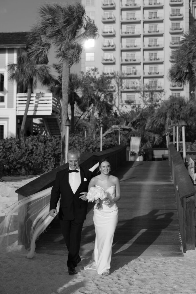 Bride walking down the aisle during the Ritz-Carlton Naples wedding by Veronica Costa Photography