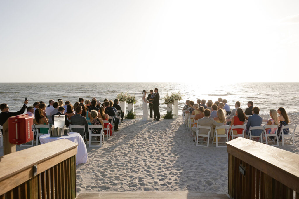 The Ritz-Carlton Golf Resort Naples wedding ceremony on beach by Veronica Costa Photography