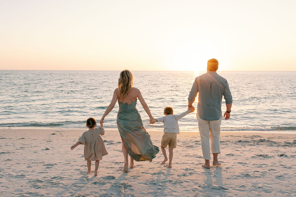 Golden light reflecting on Naples family photo session, as captured by Veronica Costa, one of the best family photographers in Naples, Florida.