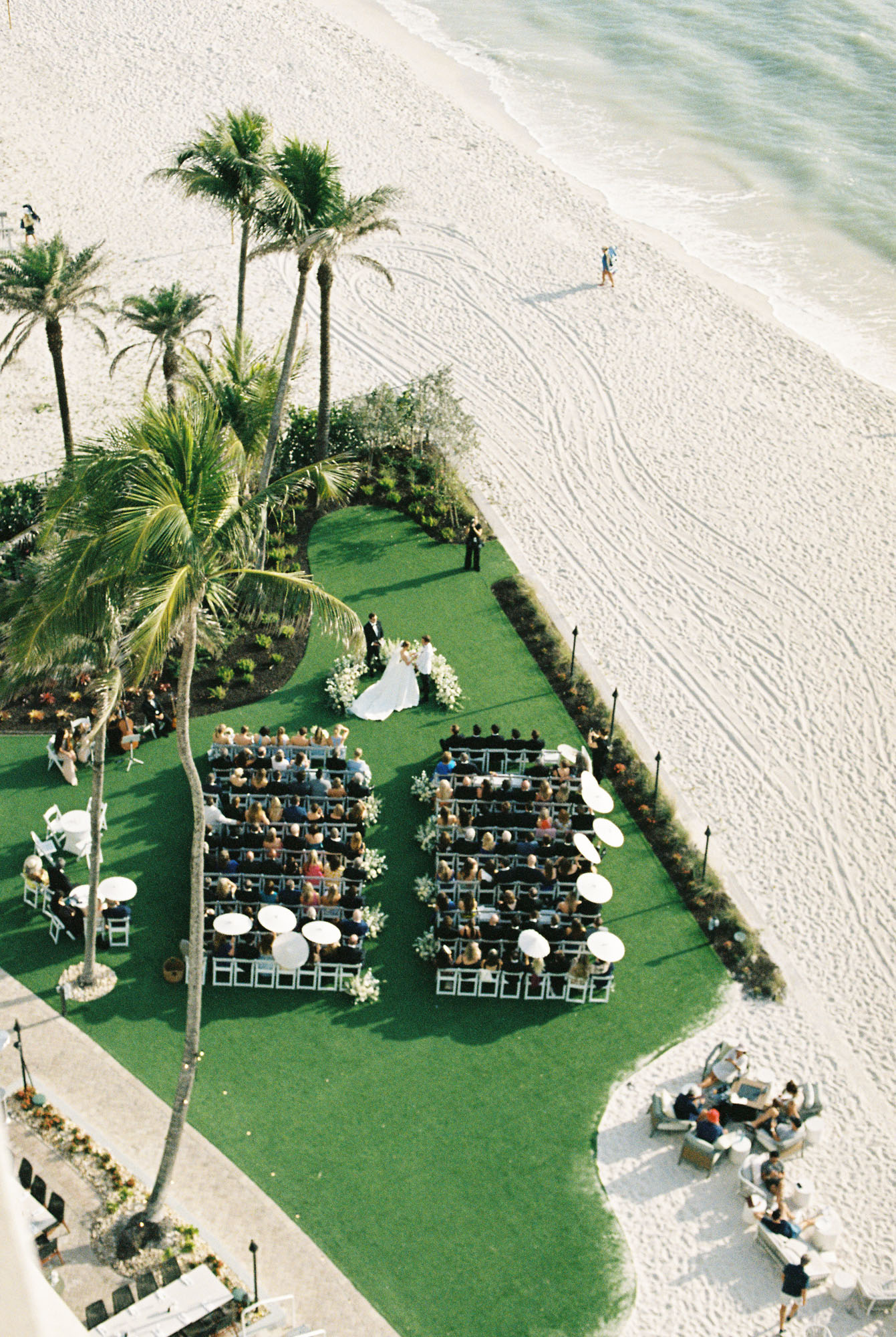 Outdoor ceremony on the Gulf Lawn at LaPlaya Beach & Golf Resort wedding by Veronica Costa Photography