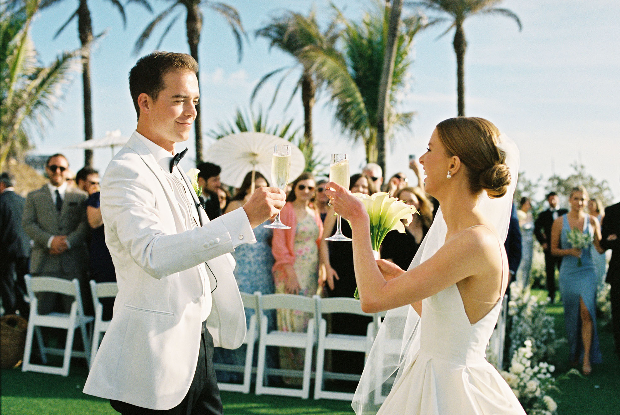 Bride and groom after wedding ceremony at LaPlaya in Naples, Florida