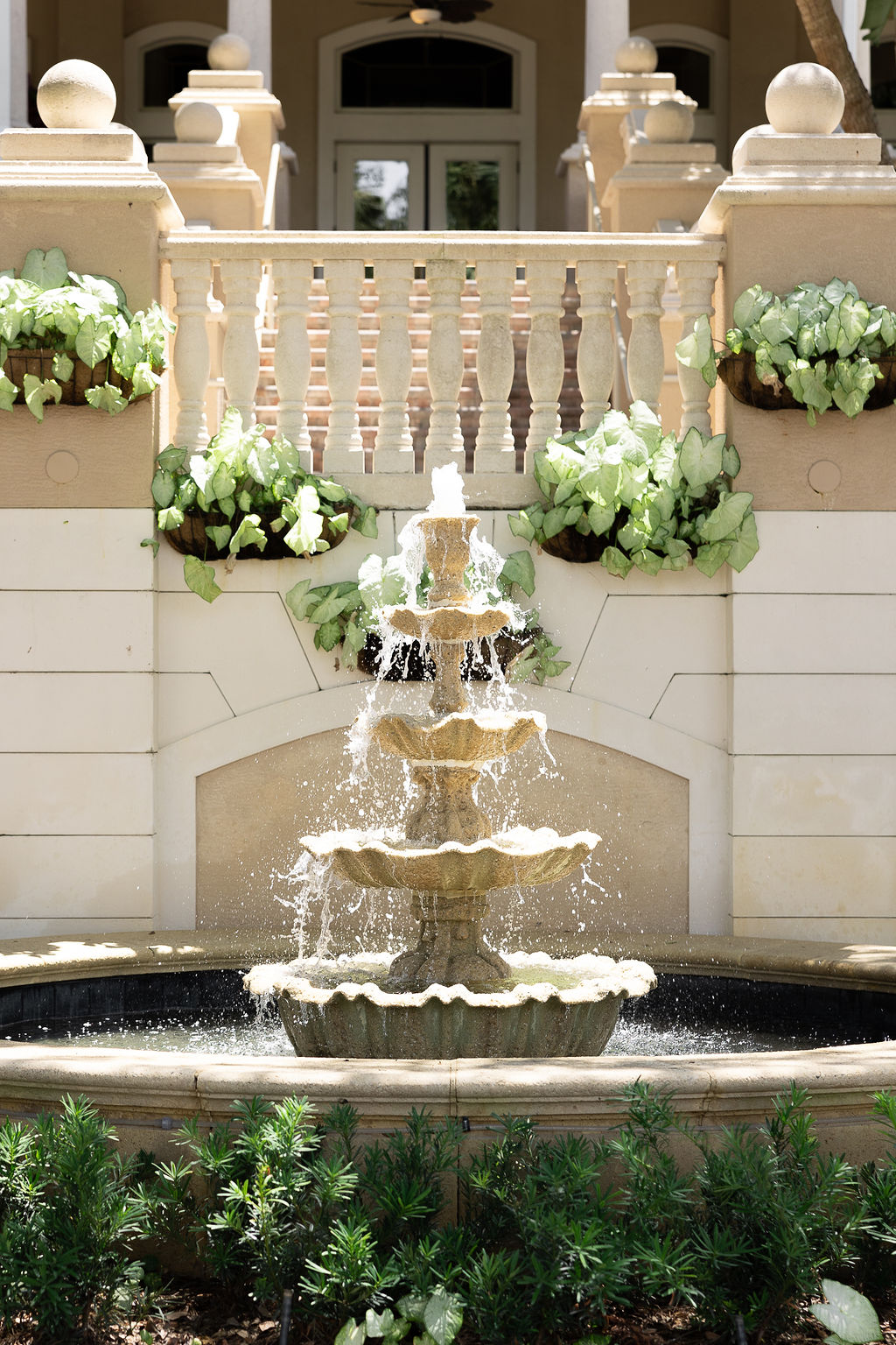 Garden fountain captured at Naples Florida wedding venue, The Club at Strand. 