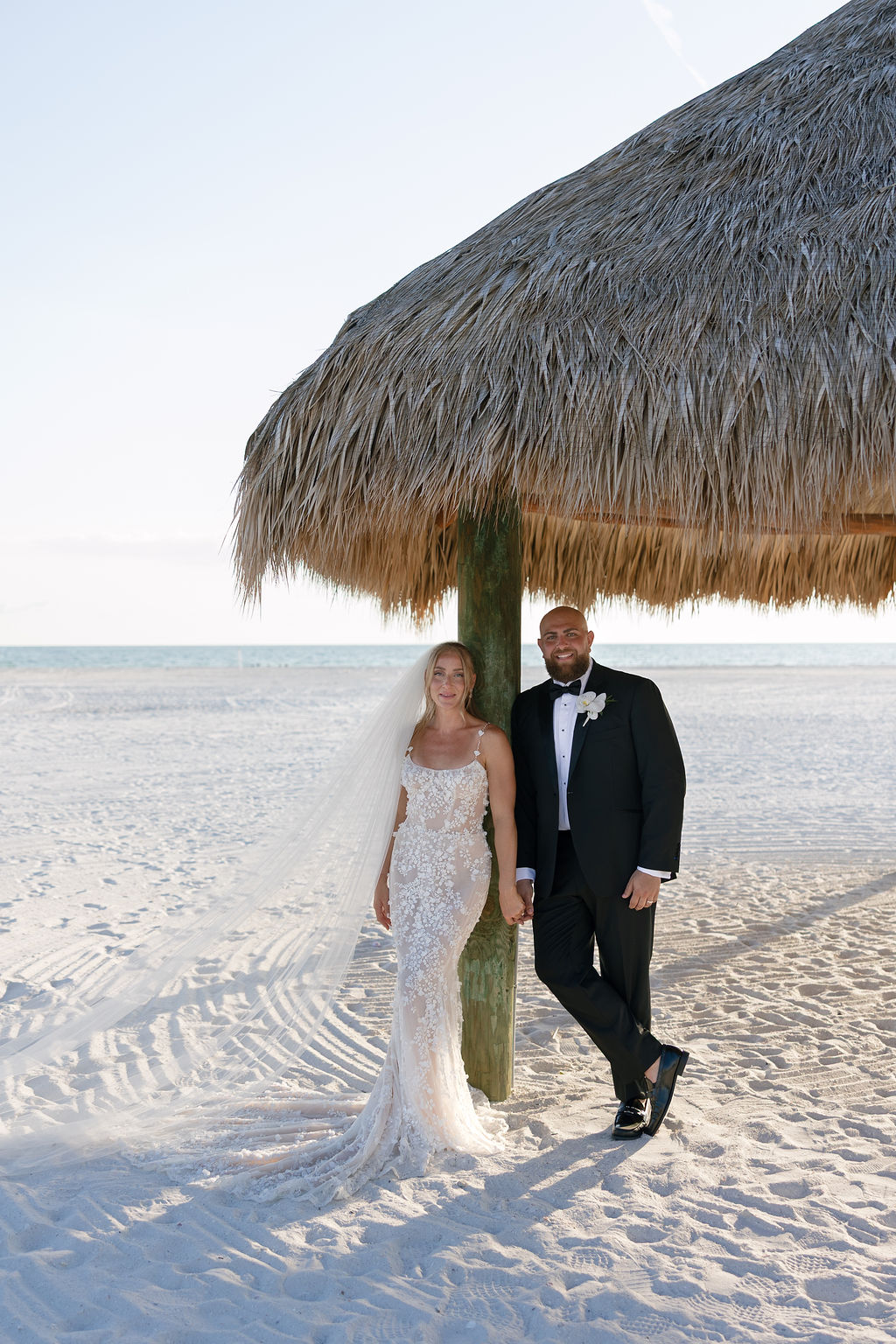 Beachfront bridal portraits at one of the most beautiful wedding venues in Naples Florida, JW Marriott Marco Island