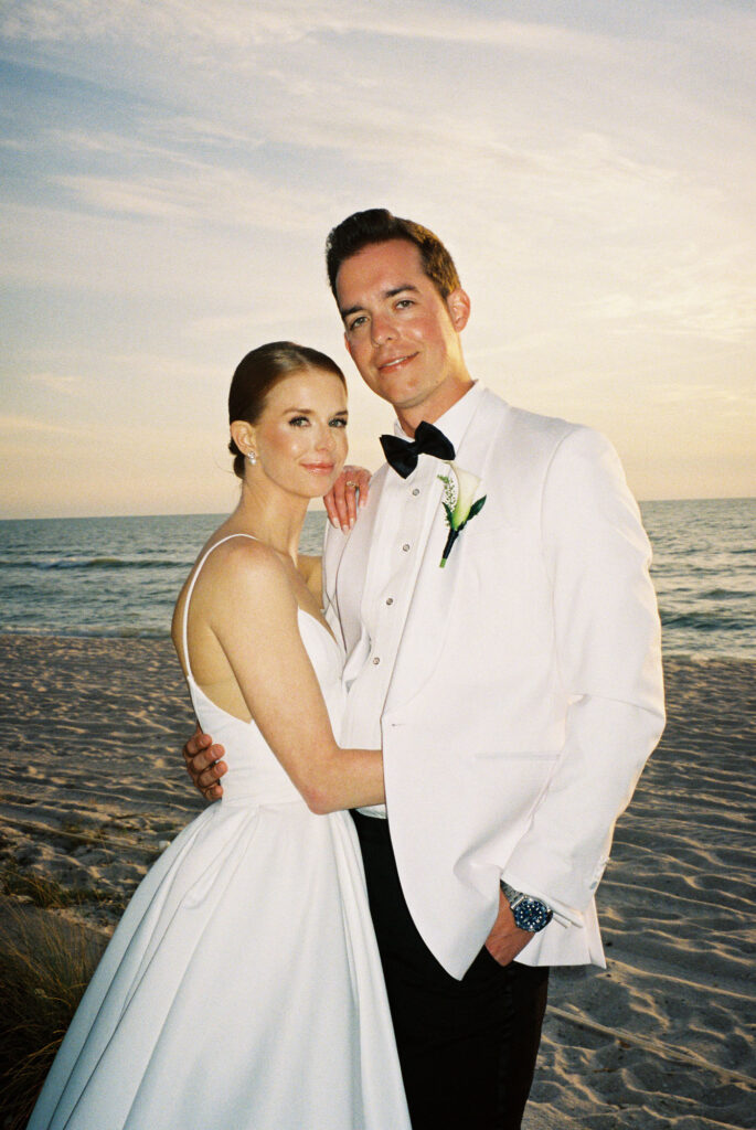 Bride and groom sunset photos on the beach during LaPlaya Naples wedding by Veronica Costa Photography