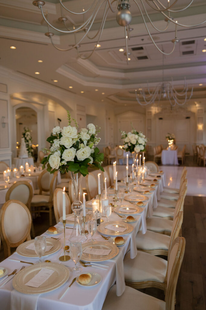 Ballroom reception setup for The Club at the Strand wedding with elegant décor by Veronica Costa Photography