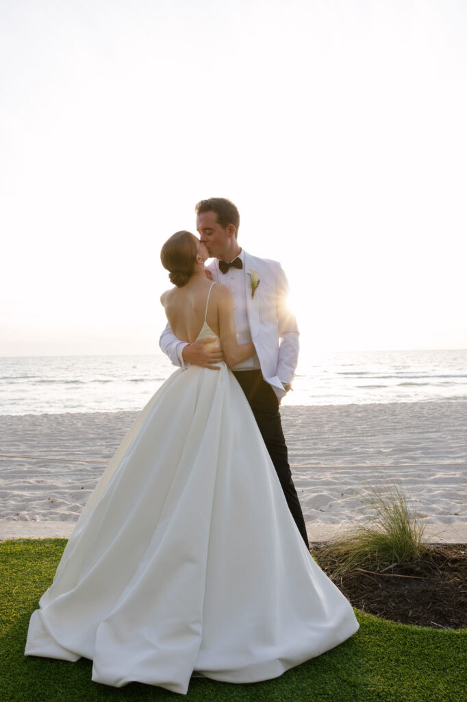 Bride and groom sunset photos on the beach during LaPlaya Naples wedding by Veronica Costa Photography